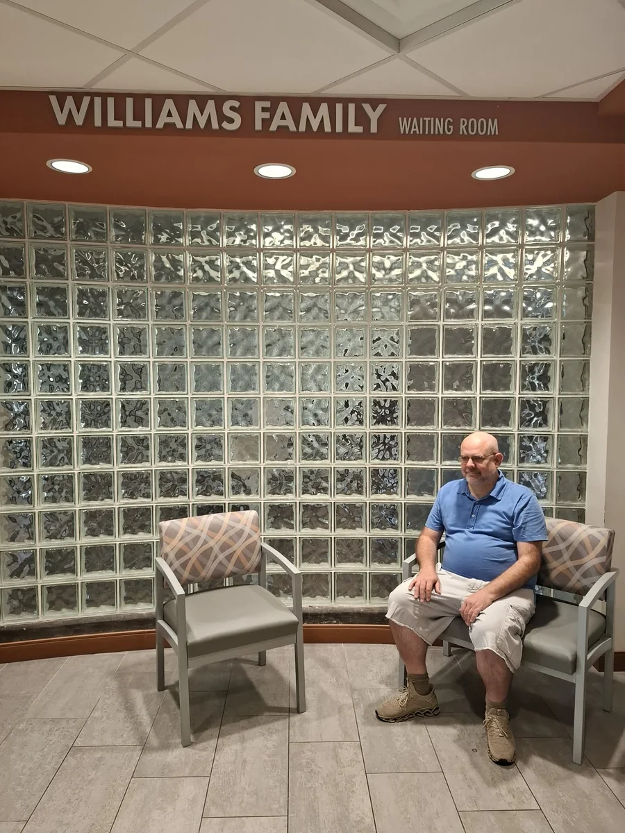 Brian at the start of Project Zero, seated in a waiting room